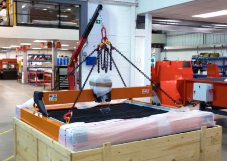 Swift-Cut Swifty CNC plasma cutting table in a crate in a warehouse