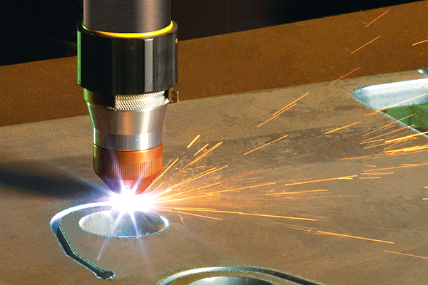 Swift-Cut XP CNC plasma table close up of ESAB torch cutting with sparks